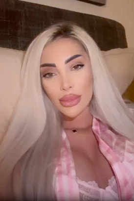 Close up of a peroxide blonde with hot red lips