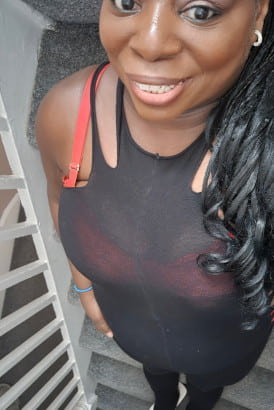 Black girl smiling and taking her selfie