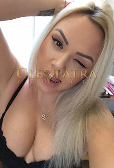 Blonde London escort sticking her tongue out in a selfie