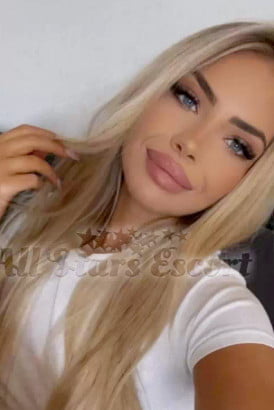 Stunning blonde girl in a white t-shirt
